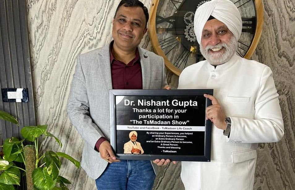 Dr. Nishant Gupta receiving a plaque from life coach T.S. Madaan for appearing on The TsMadaan Show
