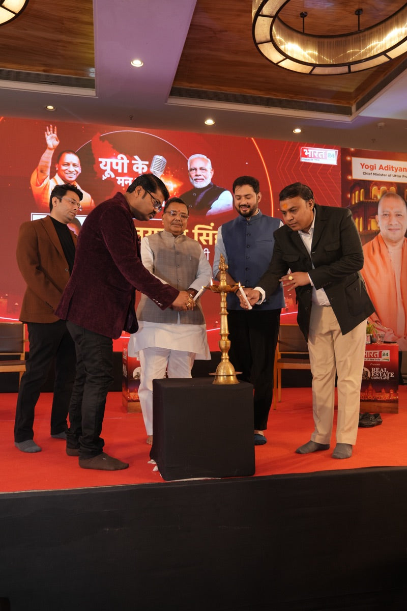 Lighting the ceremonial lamp with dignitaries